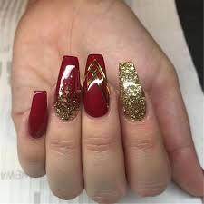 Sport beautiful red acrylic nails | naildesignsjournal.com. 30 Red Glitter Coffin Nails For Winter Makeup Inspiration Red And Gold Nails Gold Nail Designs Gold Nails