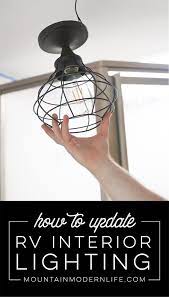 How To Update Rv Interior Lighting Mountainmodernlife Com Camper Lights Rv Interior Remodeled Campers