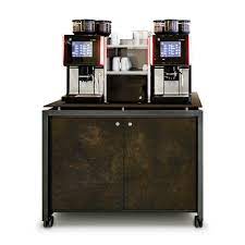 The cable is connected to the coffee grounds directly under the table top in a gn container. Coffee Station Ventadesign