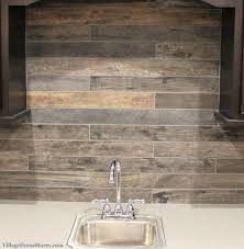 Wood Look Tile Backsplash In A Coal Valley Il Home By Hazelwood Homes Villagehomestores Com Kitchen Tiles Backsplash Backsplash Wood Look Tile