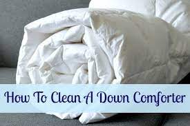 Here's how to wash a down comforter to keep it clean and comfortable for years to come. How To Clean A Down Comforter Home Ec 101