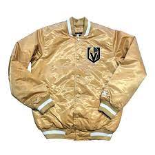 The front of the jersey has a large vegas golden knights logo on it, with small patches that represent achievements (like the captain symbol, or inaugural season patch). Vegas Golden Knights Jacket Vegas Golden Knights Gold Jacket