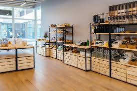 Check out our efforts and resources here linktr.ee/zerowastemalaysia_official. Zero Waste Shop Interior Details Wooden Shelves With Different Food Goods And Personal Hygiene Or Cosmetics Products In Plastic Free Grocery Store Eco Friendly Shopping At Local Small Businesses Stock Photo Adobe