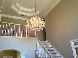 What Is The Best Size For A Chandelier In A Two Story Average Foyer This means you'll have to make some tough choices when decorating this space. chandelier in a two story average foyer