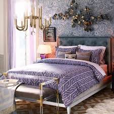 The guest bedroom of an eclectic adriatic home features a punchy purple accent wall, which backs a woven screen from burundi that serves as the headboard. 25 Purple And Lilac Bedroom Decor Ideas Shelterness