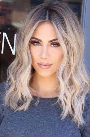 The gradient color blends from bronde to butter as softly as if it was made by the sun. 47 Medium Length Haircuts That Never Go Out Of Style Balayage Hair Blonde Medium Ombre Hair Blonde Balayage Hair Blonde
