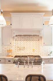 Since the tiles are manufactured and sold individually, the design. Glazed Brick Backsplash With Herringbone Pattern Pot Filler Niche By Rafterhouse Trendy Kitchen Backsplash Kitchen Niche Kitchen Remodel
