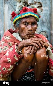 Ifugao elder dressed in the traditional manner at a viewpoint near Banaue  Stock Photo