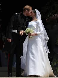 Meghan markle wore a haute couture givenchy wedding dress by clare waight keller for her royal wedding to prince harry on saturday. Meghan Markle Stuns In A Bespoke White Silk Givenchy Wedding Dress And 15ft Veil Embroidered With Flowers Of The Commonwealth