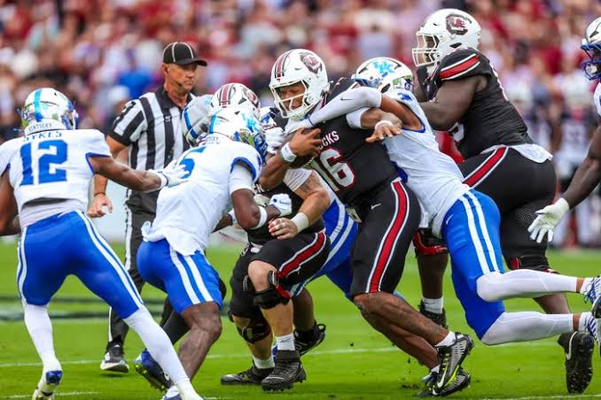 Kentucky vs South Carolina in NCAA football. See game photos