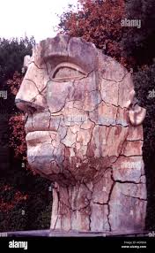 Giant cracked face statue hi-res stock photography and images