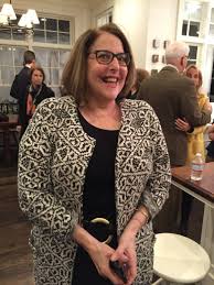 Commissioner sues city after tripping over parking barrier ...