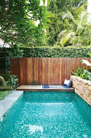 We hope these seven pool designs suited to tight spaces have inspired you to add a swimming pool to your small yard. This Compact Sydney Garden Is Inspired By Bali Swimming Pools Backyard Backyard Pool Small Pool Design