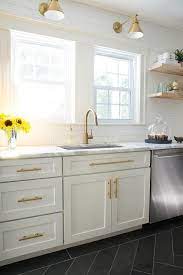 White And Gold Kitchen With Schoolhouse Electric Princeton Senior Sconces Contemporary Kitchen Kitchen Design Kitchen Remodel Kitchen Inspirations