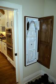 Our new laundry room design has pretty much left no room to tuck away our old ironing board. Ironing Board Cabinet Hide Away Belezaa Decorations From How To Build Ironing Board Cabinet Pictures