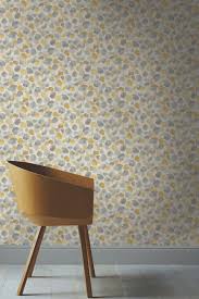 Painted Dots Wallpaper Design By Arthouse In Mustard And Grey Mustard Living Room Wallpaper Feature Wall Bedroom Wallpaper Living Room
