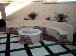 Stucco W Exposed Stones 4 Square Tiles Per Squared Section Grass Grout Outdoor Fire Pit Stone Fire Pit Fire Pit