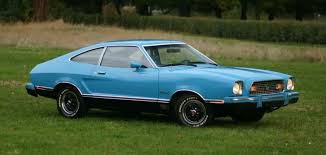 Mach 1s also include an upgraded suspension, teak wood interior trim, and some extra comfort and convenience features. Light Grabber Blue 1974 Mach 1 Mustang Ii Hatchback Mustang Ii Mustang Blue Mustang