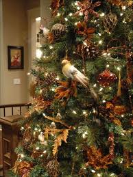 My Tree Is Done In More Natural Things This Year Lots Of Birds Owls And Critters Decor Creative Christmas Trees Christmas Tree Design Natural Christmas Tree