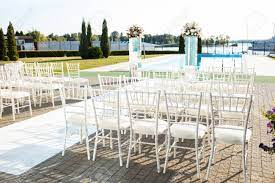 It is amazing how a simple change in floral can create a completely. White Chiavari Chairs For Wedding Guests At The Ceremony Stock Photo Picture And Royalty Free Image Image 85053902