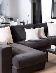 This apartment has all white walls except for this red accent wall in the office. 5 Modern Black White Apartments With Amazing Interior Designs