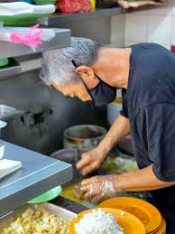 Tian tian is a short bus ride from redhill mrt station. The Silver Chef Traditional Hainanese Curry Rice Redhill Market