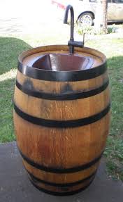 If you already have a pergola, maybe this project on a budget will inspire you. Diy Outdoor Sink Of An Old Wine Barrel Shelterness