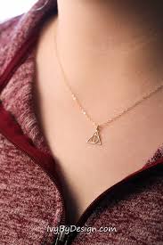 Each necklace is made to order and has been designed and handcrafted by skilled artisans. Deathly Hallows Necklace Dainty Gold Charm Necklace Gold Pendant Harry Potter Necklace Harry Potter Necklace Harry Potter Jewelry Deathly Hallows Necklace