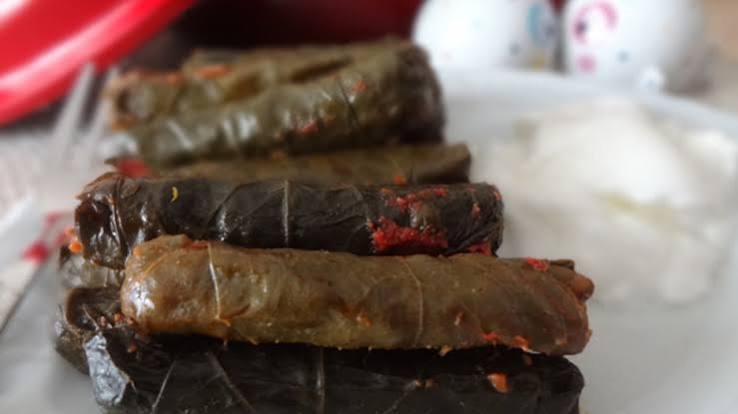 Stuffed Grape Leaves with Pomegranate Molasses