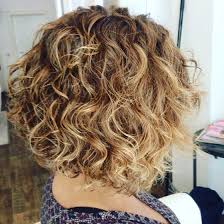 Chic hairstyle for a woma over 40. 20 Simple Curly Hairstyles For Women Over 40