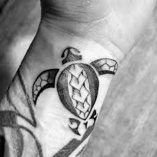 They also represent the absence of turmoil or relevant peace in the life of a man. 70 Tribal Turtle Tattoo Designs For Men Manly Ink Ideas Tribal Turtle Tattoos Turtle Tattoo Designs Wrist Tattoos For Guys
