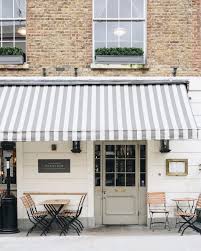 Striped Awnings Maison Parisienne Facade Boutique Maison