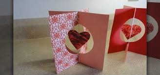 Fold the card in half. How To Craft A Pretty 3d Stand Up Card With Hanging Stained Glass Crayon Hearts Papercraft Wonderhowto