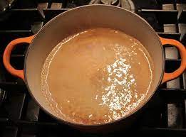 English language learners definition of simmer · to cook (something) so that it is almost boiling for a certain period of time · to be filled with a strong . Simmer Definition Mother Would Know