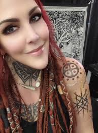 Who are good tattoo artists in Regina?