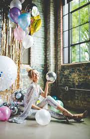 A disco ball (also known as a mirror ball or glitter ball) is a roughly spherical object that reflects light directed at it in many directions, producing a complex display. 12 Inch Disco Ball Photoshoot Props Available To Rent Opal And June
