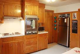 (if you use the steel wool, always rub with the wood grain. Frances And Doug S Warm And Inviting Restored 1950s Wood Kitchen Birch Kitchen Cabinets Kitchen Soffit Kitchen Remodel Pictures