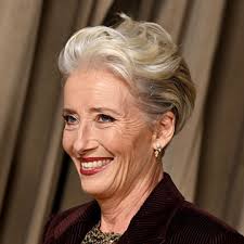 Helen Skelton has silver hair glow as she walks the red carpet with grey  fox Gethin Jones