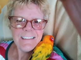 Introduction of Mayki the parrot and her love for coriander leaves