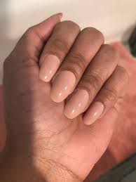 Coffin nails range from short to long in length, are tapered at the ends, and are squared off (like a coffin). Nude Peach Pink Coffin Nails Static Nails