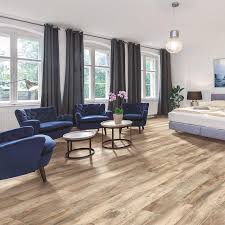 The waterproof vinyl flooring & tile you can't resist. Pergo Portfolio Wetprotect Waterproof Brentwood Pine 7 48 In W X 47 24 In L Waterproof Embossed Wood Plank Laminate Flooring 22 09 Sq Ft Lowes Com Pergo Flooring Laminate Flooring Natural Wood Flooring