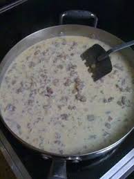 Biscuits And Gravy Recipe Paula Deen Sawmill Gravy Paula Deen Recipe Food Recipes Food Homemade Biscuits