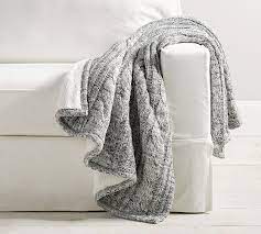 Medium weight blanket comes in elephant gray, off white and teal / turquoise blue color. Cozy Cable Knit Throws Pottery Barn