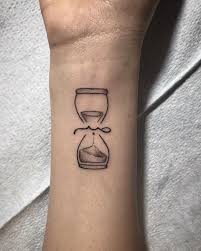 Owl And Sand Clock Tattoo