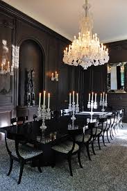 Hercules series black ladder back metal restaurant chair with black vinyl seat. Lenny Kravitz Paris Elegant Dining Room Black Dining Room Black And White Dining Room