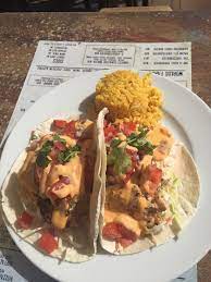 After 5 minutes, flip fish and cook on the other side for about 2 minutes, or until fish begins to flake. Angry Fish Tacos Delish Picture Of Sunset Beach Bar St Martin St Maarten Tripadvisor