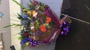 Beautiful bouquet of flowers on a wooden floor. Bouquet