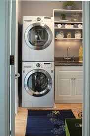 Stacked Washer Dryer In Small Space Laundry Laundry Dryer Laundry Room Storage Laundry Room Storage Shelves