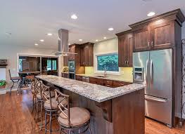 Dark flooring and cabinets with an authentic arrangement of kitchen this kitchen with a dark wood island looks brilliant because the dark flooring blends in with the island while the creamy. 30 Classy Projects With Dark Kitchen Cabinets Home Remodeling Contractors Sebring Design Build