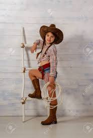 Maybe you would like to learn more about one of these? Little Girl In A Wide Brimmed Cowboy Hat And Traditional Dress Stock Photo Picture And Royalty Free Image Image 120777874